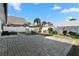 Brick paved patio area next to the pool and yard at 3603 Surfside Ter, Port Orange, FL 32127