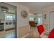 View of the kitchen and living room with updated appliances and holiday decor at 404 S Beach St # 010 101, Daytona Beach, FL 32114