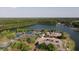 Tennis courts and community lake aerial view at 437 Harbour Town Ln, Ormond Beach, FL 32174