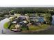 Aerial view showing community amenities including pool, tennis courts, and clubhouse at 437 Harbour Town Ln, Ormond Beach, FL 32174