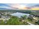 Community lakefront and clubhouse aerial view at 437 Harbour Town Ln, Ormond Beach, FL 32174