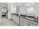 Large bathroom with double vanity, walk-in shower, and separate tub at 437 Harbour Town Ln, Ormond Beach, FL 32174