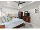 Bright bedroom with wooden bed frame and plenty of natural light at 437 Harbour Town Ln, Ormond Beach, FL 32174