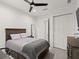 Bedroom with a queen bed and built-in drawers at 437 Harbour Town Ln, Ormond Beach, FL 32174