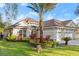 Spacious home with attractive landscaping and a three-car garage at 437 Harbour Town Ln, Ormond Beach, FL 32174