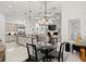 Modern kitchen with island, stainless steel appliances, and breakfast nook at 437 Harbour Town Ln, Ormond Beach, FL 32174