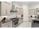 Modern kitchen with stainless steel appliances and custom cabinetry at 437 Harbour Town Ln, Ormond Beach, FL 32174