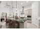 Gourmet kitchen featuring a large island and stylish pendant lighting at 437 Harbour Town Ln, Ormond Beach, FL 32174
