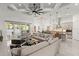 Spacious living room with open floor plan and a view of the kitchen at 437 Harbour Town Ln, Ormond Beach, FL 32174