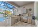 Outdoor kitchen with granite countertops at 437 Harbour Town Ln, Ormond Beach, FL 32174