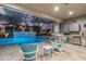 Enjoy the screened-in pool area with a built-in bar and comfortable seating at 437 Harbour Town Ln, Ormond Beach, FL 32174