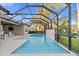 Lush landscaping surrounds this refreshing pool at 437 Harbour Town Ln, Ormond Beach, FL 32174