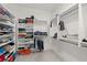 Large walk-in closet with ample shelving and hanging space at 437 Harbour Town Ln, Ormond Beach, FL 32174
