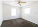 Simple bedroom with neutral carpeting at 451 Arthur Ave, Daytona Beach, FL 32114