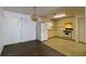 Simple kitchen with white cabinets and appliances at 451 Arthur Ave, Daytona Beach, FL 32114
