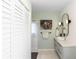 Modern bathroom with updated vanity, fixtures, and a large mirror at 5178 Riverside Dr, Port Orange, FL 32127