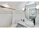 Updated bathroom with a walk-in shower and a sleek design at 5178 Riverside Dr, Port Orange, FL 32127