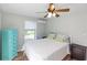 Comfortable bedroom with a ceiling fan at 5178 Riverside Dr, Port Orange, FL 32127