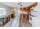 Modern kitchen with wood cabinets and appliances at 5178 Riverside Dr, Port Orange, FL 32127