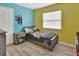 bedroom with colorful walls, single bed, and playful decor at 866 Pratt St, Deland, FL 32720