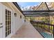 Balcony with access from the house and pool views at 973 Bearded Oaks Ter, Longwood, FL 32779