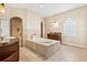 Elegant bathroom with soaking tub, shower, and marble vanity at 973 Bearded Oaks Ter, Longwood, FL 32779