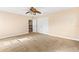 Spacious bedroom with double doors and neutral carpet at 973 Bearded Oaks Ter, Longwood, FL 32779