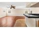 Spacious game room with hardwood floors and a breakfast bar at 973 Bearded Oaks Ter, Longwood, FL 32779