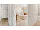 Main bathroom with soaking tub and walk-in closet at 973 Bearded Oaks Ter, Longwood, FL 32779