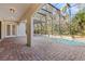 Screened pool and spa with brick pavers and spacious patio at 973 Bearded Oaks Ter, Longwood, FL 32779