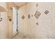 Large walk-in shower with tile surround and built-in seat at 973 Bearded Oaks Ter, Longwood, FL 32779