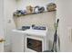 Laundry room with washer, dryer and shelving at 151 Saddlebrook Way, Deland, FL 32724