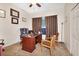Home office with a desk and two chairs at 151 Saddlebrook Way, Deland, FL 32724
