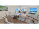 Coastal-themed dining area showcasing a rustic table and ocean views at 2300 N Atlantic Ave # 1701, Daytona Beach, FL 32118