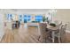 Ocean view dining area with hardwood floors and stylish furnishings at 2300 N Atlantic Ave # 1701, Daytona Beach, FL 32118