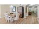 Elegant dining room featuring a wood table and chandelier at 2300 N Atlantic Ave # 1701, Daytona Beach, FL 32118