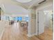 Bright entryway with hardwood floors, leading to an open living area with ocean views at 2300 N Atlantic Ave # 1701, Daytona Beach, FL 32118