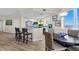 Modern kitchen with breakfast bar, stainless steel appliances, and ocean view at 2300 N Atlantic Ave # 1701, Daytona Beach, FL 32118