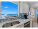 Kitchen with stainless steel sink and ocean view at 2300 N Atlantic Ave # 1701, Daytona Beach, FL 32118
