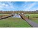 Wooden dock with two boats on a river at 2329 River Ridge Rd # 13, Deland, FL 32720