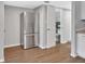 Modern kitchen features stainless steel appliances and light wood flooring at 2329 River Ridge Rd # 13, Deland, FL 32720