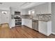 Modern kitchen with stainless steel appliances at 2329 River Ridge Rd # 13, Deland, FL 32720