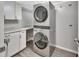 Laundry room with stackable washer and dryer at 2329 River Ridge Rd # 13, Deland, FL 32720
