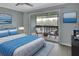 Main bedroom with private balcony overlooking a tranquil river at 2329 River Ridge Rd # 13, Deland, FL 32720