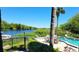 Community pool with river views and lounge chairs at 2329 River Ridge Rd # 13, Deland, FL 32720