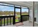 Relaxing screened porch overlooking the river and dock at 2329 River Ridge Rd # 13, Deland, FL 32720