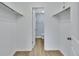 Spacious walk-in closet with double hanging rods and ample storage at 2329 River Ridge Rd # 13, Deland, FL 32720