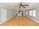 Hardwood floors and ceiling fans in the living room at 2504 S Crystal Lake Dr, Orlando, FL 32806