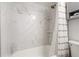 Clean bathroom with marble tile and shower at 2700 Ocean Shore Blvd # 317, Ormond Beach, FL 32176