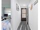 Condo entryway with wood-look floors at 2700 Ocean Shore Blvd # 317, Ormond Beach, FL 32176